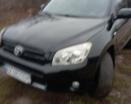 Черный Тойота РАВ 4, объемом двигателя 2 л и пробегом 225 тыс. км за 9000 $, фото 1 на Automoto.ua