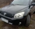 Черный Тойота РАВ 4, объемом двигателя 2 л и пробегом 225 тыс. км за 9000 $, фото 1 на Automoto.ua