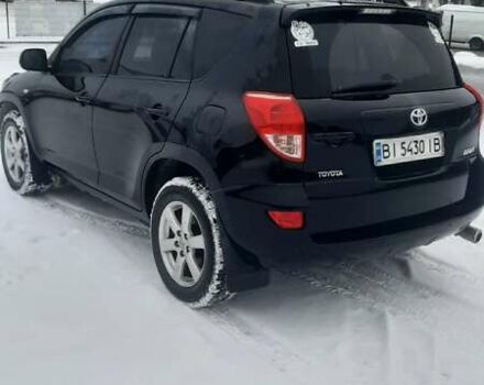 Чорний Тойота РАВ 4, об'ємом двигуна 2 л та пробігом 248 тис. км за 10600 $, фото 2 на Automoto.ua