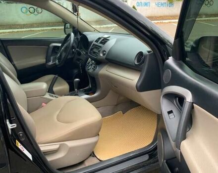 Черный Тойота РАВ 4, объемом двигателя 2.36 л и пробегом 196 тыс. км за 9500 $, фото 4 на Automoto.ua