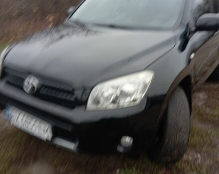 Черный Тойота РАВ 4, объемом двигателя 2 л и пробегом 225 тыс. км за 9000 $, фото 1 на Automoto.ua