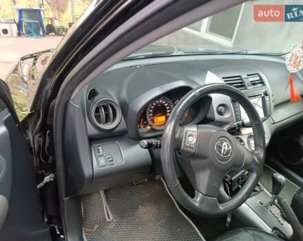 Чорний Тойота РАВ 4, об'ємом двигуна 2.36 л та пробігом 195 тис. км за 9500 $, фото 7 на Automoto.ua
