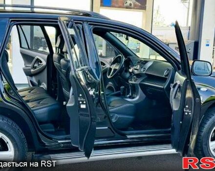 Черный Тойота РАВ 4, объемом двигателя 2 л и пробегом 200 тыс. км за 11000 $, фото 3 на Automoto.ua