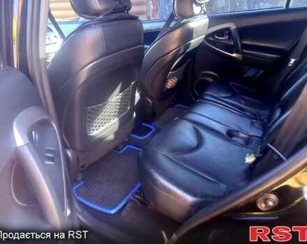 Чорний Тойота РАВ 4, об'ємом двигуна 2.4 л та пробігом 215 тис. км за 10800 $, фото 6 на Automoto.ua