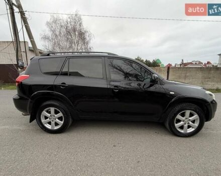 Черный Тойота РАВ 4, объемом двигателя 2.4 л и пробегом 173 тыс. км за 10500 $, фото 3 на Automoto.ua