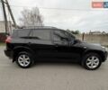 Черный Тойота РАВ 4, объемом двигателя 2.4 л и пробегом 173 тыс. км за 10500 $, фото 3 на Automoto.ua