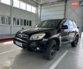 Чорний Тойота РАВ 4, об'ємом двигуна 2 л та пробігом 240 тис. км за 9500 $, фото 2 на Automoto.ua
