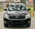 Чорний Тойота РАВ 4, об'ємом двигуна 2 л та пробігом 176 тис. км за 10750 $, фото 1 на Automoto.ua