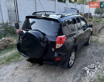 Черный Тойота РАВ 4, объемом двигателя 2 л и пробегом 151 тыс. км за 9800 $, фото 3 на Automoto.ua