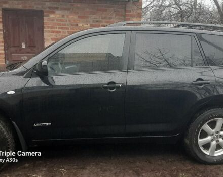 Черный Тойота РАВ 4, объемом двигателя 2.4 л и пробегом 317 тыс. км за 9500 $, фото 3 на Automoto.ua