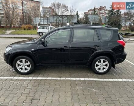 Чорний Тойота РАВ 4, об'ємом двигуна 2.4 л та пробігом 254 тис. км за 12000 $, фото 3 на Automoto.ua