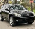 Черный Тойота РАВ 4, объемом двигателя 2 л и пробегом 176 тыс. км за 10750 $, фото 1 на Automoto.ua