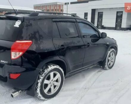 Чорний Тойота РАВ 4, об'ємом двигуна 2 л та пробігом 248 тис. км за 10600 $, фото 3 на Automoto.ua