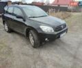 Черный Тойота РАВ 4, объемом двигателя 2.23 л и пробегом 205 тыс. км за 9700 $, фото 1 на Automoto.ua