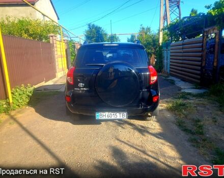 Чорний Тойота РАВ 4, об'ємом двигуна 2.4 л та пробігом 215 тис. км за 10800 $, фото 1 на Automoto.ua