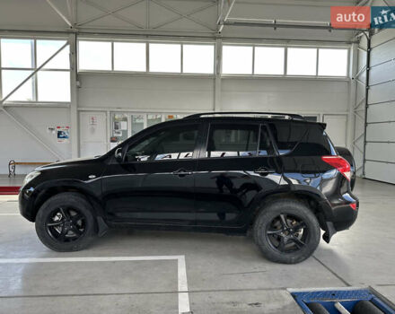 Чорний Тойота РАВ 4, об'ємом двигуна 2 л та пробігом 240 тис. км за 9500 $, фото 3 на Automoto.ua