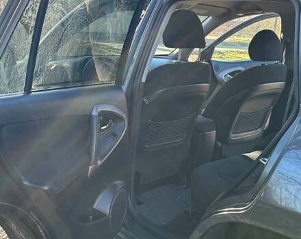Черный Тойота РАВ 4, объемом двигателя 2 л и пробегом 248 тыс. км за 9799 $, фото 6 на Automoto.ua