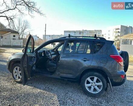 Черный Тойота РАВ 4, объемом двигателя 2 л и пробегом 248 тыс. км за 9799 $, фото 7 на Automoto.ua