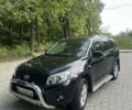 Черный Тойота РАВ 4, объемом двигателя 2.36 л и пробегом 107 тыс. км за 11900 $, фото 1 на Automoto.ua
