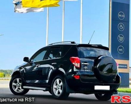 Черный Тойота РАВ 4, объемом двигателя 2 л и пробегом 200 тыс. км за 11000 $, фото 1 на Automoto.ua