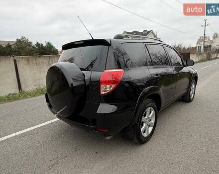Черный Тойота РАВ 4, объемом двигателя 2.4 л и пробегом 173 тыс. км за 10500 $, фото 4 на Automoto.ua