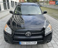Черный Тойота РАВ 4, объемом двигателя 2.49 л и пробегом 220 тыс. км за 10500 $, фото 1 на Automoto.ua