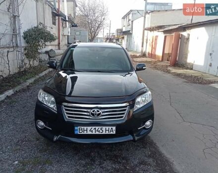 Чорний Тойота РАВ 4, об'ємом двигуна 2 л та пробігом 105 тис. км за 16200 $, фото 1 на Automoto.ua