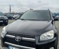 Чорний Тойота РАВ 4, об'ємом двигуна 2.36 л та пробігом 241 тис. км за 13600 $, фото 1 на Automoto.ua