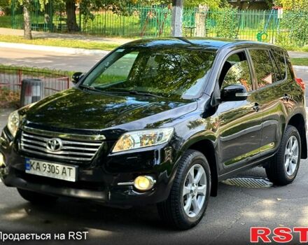 Чорний Тойота РАВ 4, об'ємом двигуна 2 л та пробігом 140 тис. км за 11500 $, фото 1 на Automoto.ua