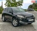 Чорний Тойота РАВ 4, об'ємом двигуна 2 л та пробігом 210 тис. км за 12500 $, фото 1 на Automoto.ua