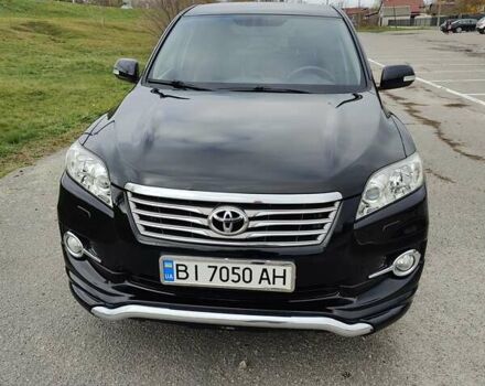 Черный Тойота РАВ 4, объемом двигателя 2 л и пробегом 120 тыс. км за 16000 $, фото 1 на Automoto.ua