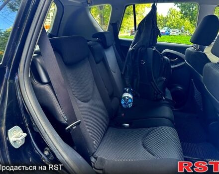 Чорний Тойота РАВ 4, об'ємом двигуна 2 л та пробігом 140 тис. км за 11500 $, фото 6 на Automoto.ua