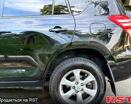 Чорний Тойота РАВ 4, об'ємом двигуна 2 л та пробігом 140 тис. км за 11500 $, фото 7 на Automoto.ua