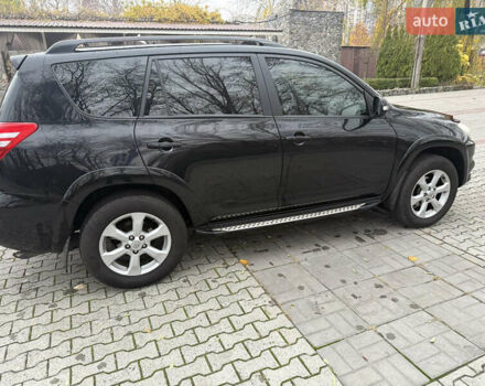 Черный Тойота РАВ 4, объемом двигателя 2.36 л и пробегом 155 тыс. км за 12500 $, фото 2 на Automoto.ua