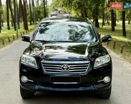 Чорний Тойота РАВ 4, об'ємом двигуна 2 л та пробігом 153 тис. км за 12999 $, фото 1 на Automoto.ua