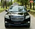 Чорний Тойота РАВ 4, об'ємом двигуна 2 л та пробігом 153 тис. км за 12999 $, фото 1 на Automoto.ua