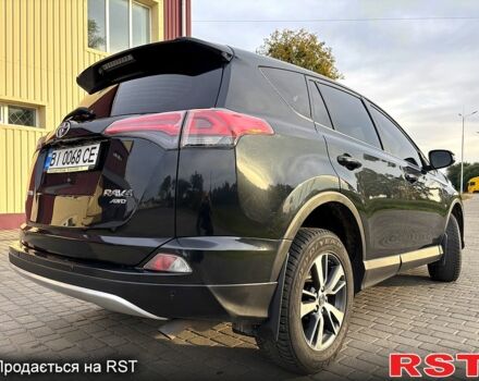 Тойота РАВ 4 2015 у Гадяче на Automoto.ua Чорний Тойота РАВ 4, об'ємом двигуна 2 л та пробігом 210 тис. км за 14300 $, фото 5 на Automoto.ua