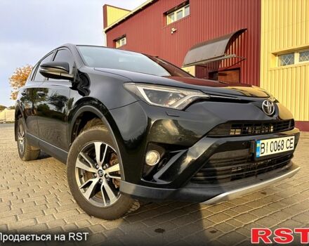 Тойота РАВ 4 2015 у Гадяче на Automoto.ua Чорний Тойота РАВ 4, об'ємом двигуна 2 л та пробігом 210 тис. км за 14300 $, фото 4 на Automoto.ua
