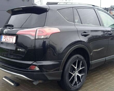 Черный Тойота РАВ 4, объемом двигателя 2 л и пробегом 128 тыс. км за 9100 $, фото 6 на Automoto.ua