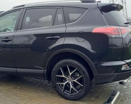 Черный Тойота РАВ 4, объемом двигателя 2 л и пробегом 128 тыс. км за 9100 $, фото 4 на Automoto.ua