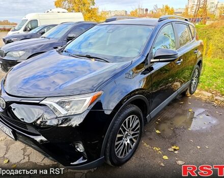 Черный Тойота РАВ 4, объемом двигателя 2.5 л и пробегом 128 тыс. км за 23000 $, фото 2 на Automoto.ua