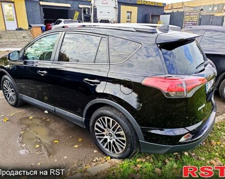 Черный Тойота РАВ 4, объемом двигателя 2.5 л и пробегом 128 тыс. км за 23000 $, фото 1 на Automoto.ua