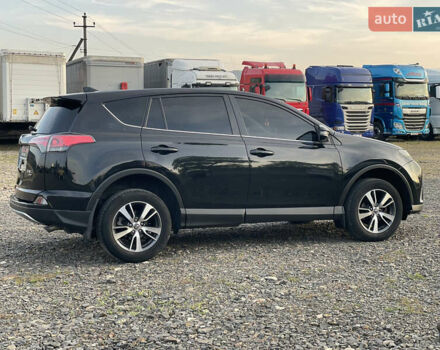 Чорний Тойота РАВ 4, об'ємом двигуна 2 л та пробігом 180 тис. км за 22700 $, фото 4 на Automoto.ua