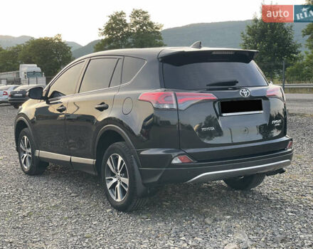 Чорний Тойота РАВ 4, об'ємом двигуна 2 л та пробігом 180 тис. км за 22700 $, фото 2 на Automoto.ua