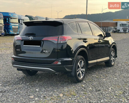 Чорний Тойота РАВ 4, об'ємом двигуна 2 л та пробігом 180 тис. км за 22700 $, фото 3 на Automoto.ua