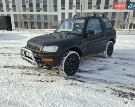 Черный Тойота РАВ 4, объемом двигателя 2 л и пробегом 299 тыс. км за 1650 $, фото 1 на Automoto.ua