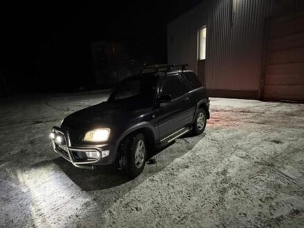 Чорний Тойота РАВ 4, об'ємом двигуна 2 л та пробігом 331 тис. км за 6000 $, фото 1 на Automoto.ua