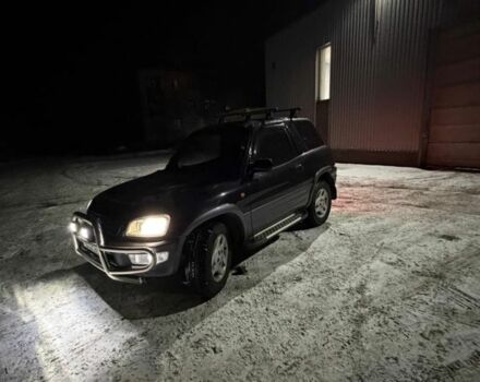 Черный Тойота РАВ 4, объемом двигателя 2 л и пробегом 331 тыс. км за 6000 $, фото 1 на Automoto.ua