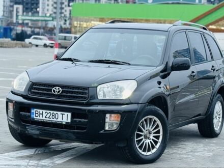 Чорний Тойота РАВ 4, об'ємом двигуна 2 л та пробігом 205 тис. км за 5900 $, фото 1 на Automoto.ua