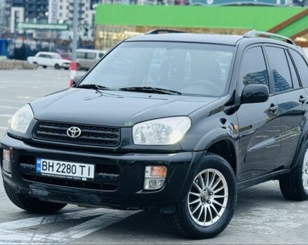Черный Тойота РАВ 4, объемом двигателя 2 л и пробегом 205 тыс. км за 5900 $, фото 1 на Automoto.ua